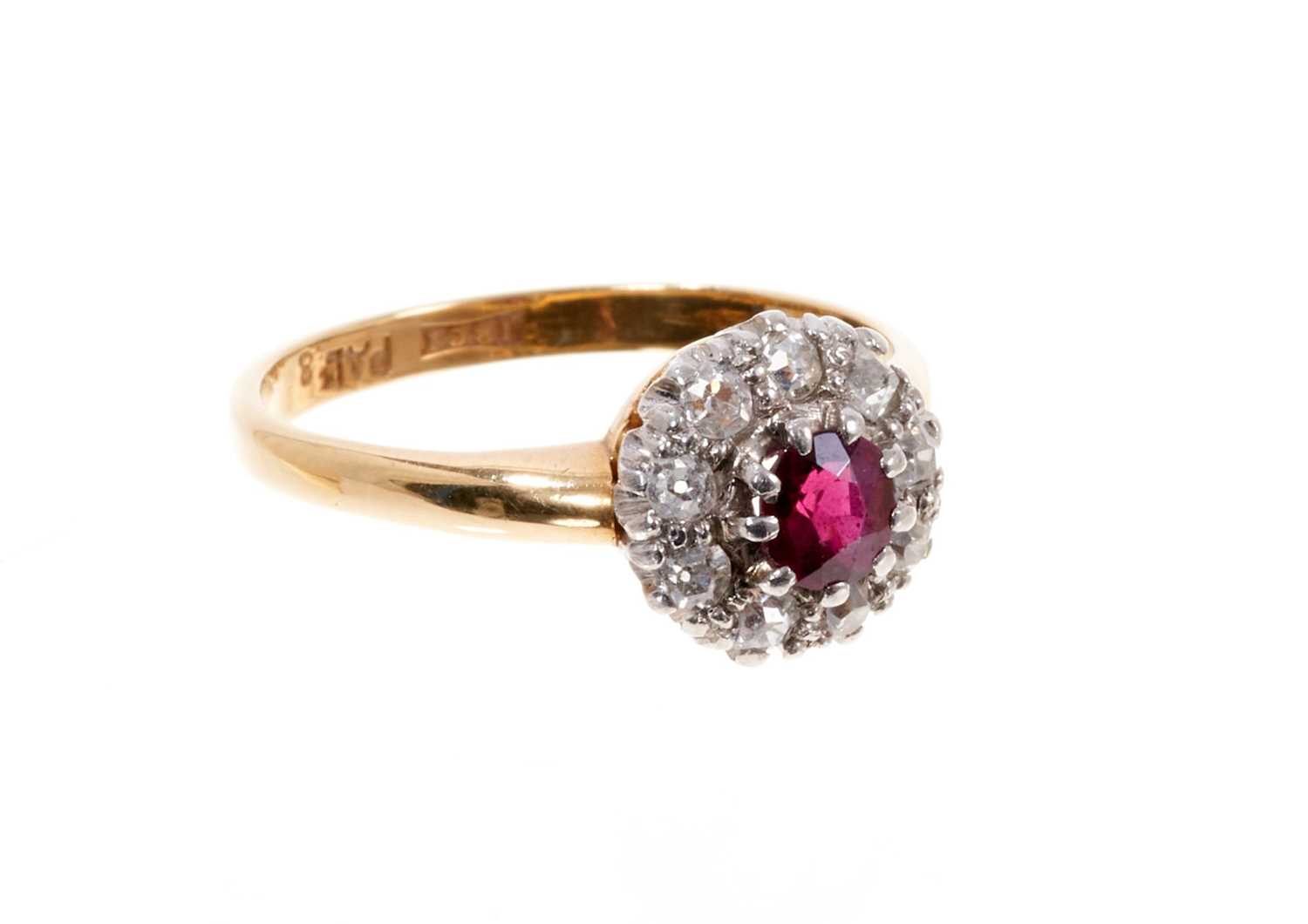 Antique ruby and diamond cluster ring with a central mixed cut ruby surrounded by nine old cut diamo - Image 2 of 3