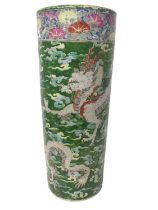 Early 20th century Chinese porcelain stick stand depicting a Dragon amongst clouds, with character m