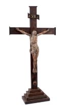 Early carved wood and polychrome painted Corpus Christi on later crucifix