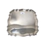 1920s silver salver of shaped square form with pie crust border