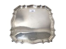 1920s silver salver of shaped square form with pie crust border