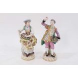 A pair of German porcelain figures