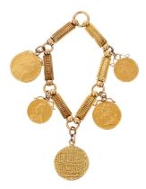 Gold charm bracelet with five gold coins