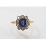 Edwardian sapphire and diamond cluster ring in platinum millegrain setting on 18ct gold shank