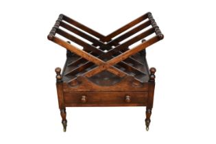 19th century mahogany canterbury, with X-form divisions and drawer below on turned legs and castors,