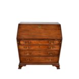 George III mahogany bureau, with well fitted stepped interior of pigeon holes and short drawers abou