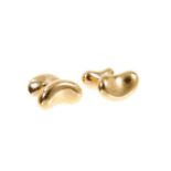 Pair of 18ct gold Tiffany & Co. 'Bean' cufflinks designed by Elsa Peretti.