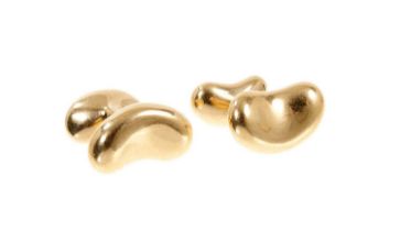 Pair of 18ct gold Tiffany & Co. 'Bean' cufflinks designed by Elsa Peretti.