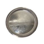 Victorian silver salver of circular form with gadrooned and reeded border,