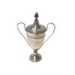 1920s silver two handled trophy cup and cover with engraved presentation inscription