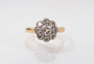 Antique diamond cluster ring with a flower head cluster ring with old cut diamonds in platinum setti