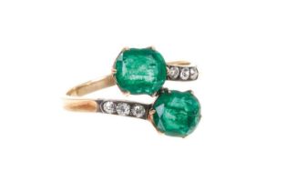 Antique emerald and diamond cross-over ring