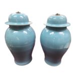 Pair of Chinese light blue glazed blue jars and covers