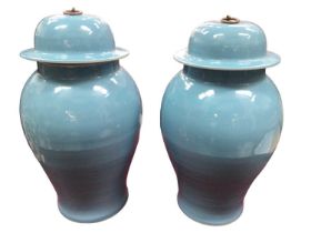 Pair of Chinese light blue glazed blue jars and covers