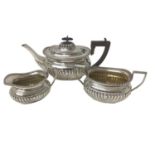 Three piece early George V silver tea set