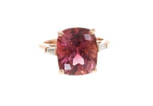 Pink tourmaline and diamond ring with a rectangular cushion cut pink tourmaline estimated to weigh a
