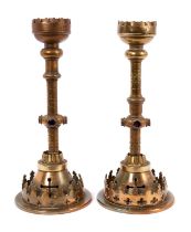 A pair of candlesticks by G Betjemann and sons, Registered Mark for 14th March 1865. Lacking some pa