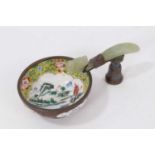 Chinese jade belt hook mounted as a handle on a Canton enamel bowl