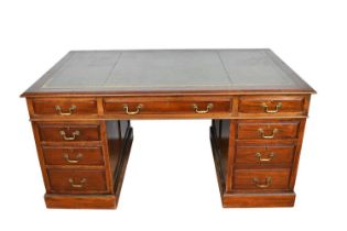 Georgian style mahogany twin pedestal desk with tooled green leather top, eight drawers with brass h