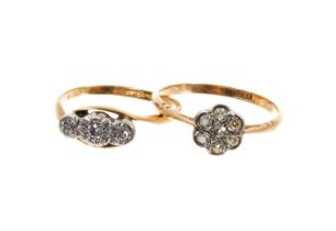 Two early 20th century 18ct gold and diamond rings to include a daisy cluster with seven old cut dia
