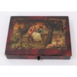 19th Century Continental lacquered papier mache box, the hinged lid decorated with a courting scene