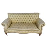 Victorian button leather upholstered sofa, rectangular form, raised on turned legs and castors, appr