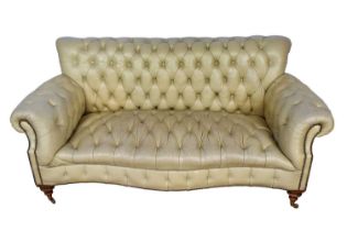 Victorian button leather upholstered sofa, rectangular form, raised on turned legs and castors, appr