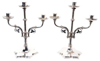 Manner of Pugin: pair of late 19th century Gothic-style plated silver candlesticks