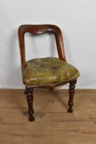 Victorian mahogany and leather upholstered hoop back chair, on turned supports