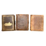 Three Victorian photograph albums to include one with a musical movement