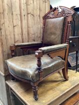 Good quality late Victorian walnut framed armchair with studded green leather seat, back and arms on