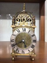 Good quality 17th century-style brass lantern clock with French movement