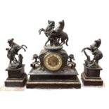 Antique black slate and marble clock garniture with spelter figure and horse surmounts