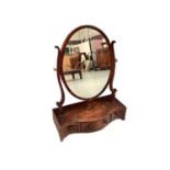 George III mahogany and barber pole strung dressing table mirror