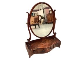 George III mahogany and barber pole strung dressing table mirror