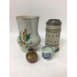 French faience jug painted with a cockerel, a German stein, etc