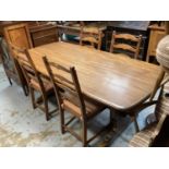 Ercol dining table and six chairs and a dresser