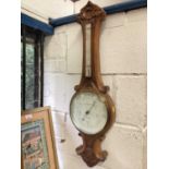 Aneroid barometer in carved frame by Maurice Cohen & Co
