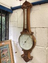 Aneroid barometer in carved frame by Maurice Cohen & Co