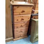 Pine narrow chest of five drawers, 43cm wide, 44cm deep, 97cm high, together with a pine blanket box