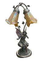 Tiffany style table lamp with two iridescent glass shades and stained glass wings to the bronzed res