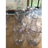 Group of 8 mostly antique glass jugs