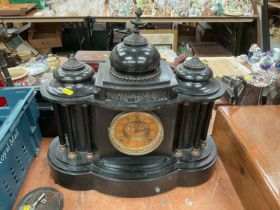 Victorian mantel clock with French 8 day striking movement in a temple shaped black slate case