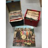 The Beatles Sgt. Pepper LP, PMC 7027 complete, together with two vintage cases of single records inc