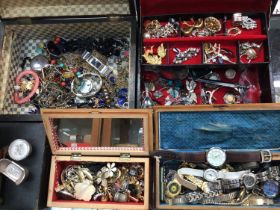 Various jewellery boxes containing costume jewellery, wristwatches and bijouterie