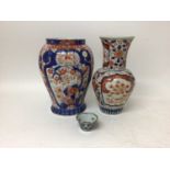 Two Japanese Imari vases and an 18th century Chinese clobbered porcelain tea bowl (3)