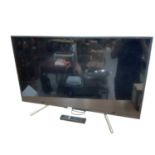 43" Sony Bravia smart TV with remote control together with Panasonic DVD Player