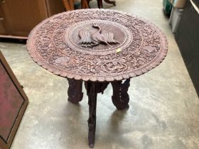 Eastern carved occasional table, 63cm diameter