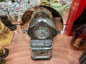 Art Deco Chromium plated alarm clock by Jaz, together with two other clocks (3)