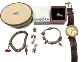 Links of London silver charm bracelet, Pandora charm bracelet and Michael Kors wristwatch